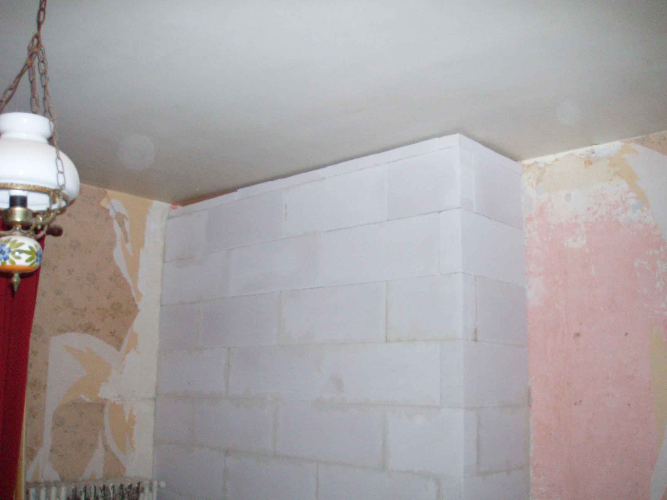 Image of New wall separating bathroom from bedroom